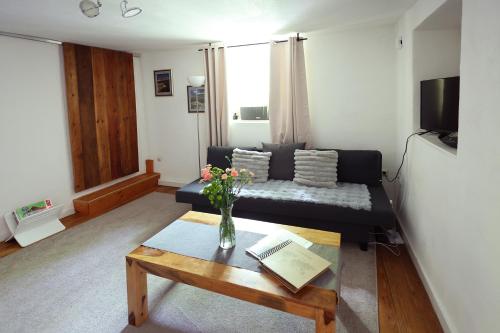 Posezení v ubytování Ferieninrosengarten - Wohnung Erdgeschoss Süd