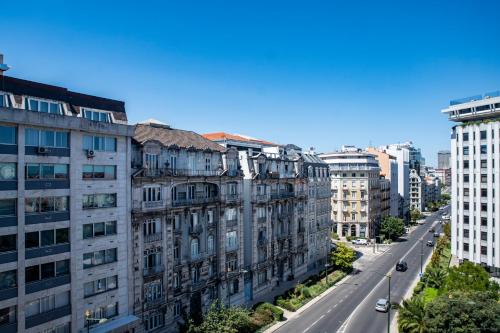 an aerial view of a city street with buildings at Mama Shelter Lisboa in Lisbon