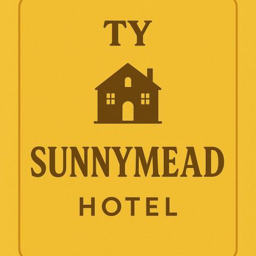 a yellow sign that reads thyimmed hotel at Ty Sunnymead Guesthouse in Aberystwyth