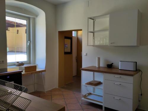 Η κουζίνα ή μικρή κουζίνα στο Wohnen im Meierhof