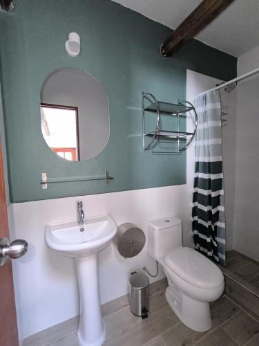 Un baño de Flying Dog Hostel Cusco