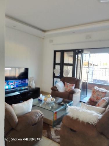 Χώρος καθιστικού στο Dups Guest House,