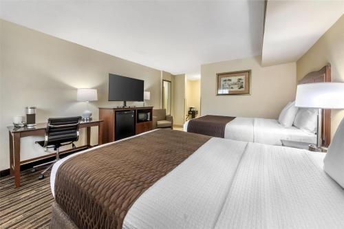 Postel nebo postele na pokoji v ubytování Best Western Plus North Miami-Bal Harbour