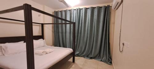 Katil atau katil-katil dalam bilik di Ocean view on 3rd avenue Apartments-nyali