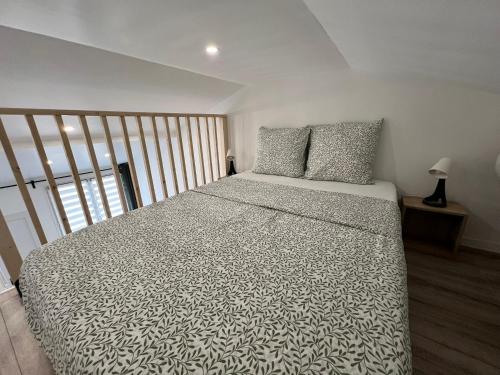 Ένα ή περισσότερα κρεβάτια σε δωμάτιο στο Mini Loft Cosy
