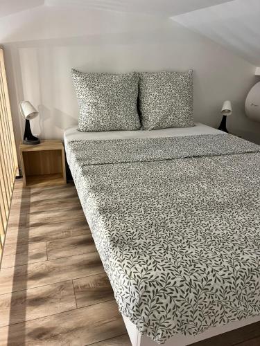 Postel nebo postele na pokoji v ubytování Mini Loft Cosy