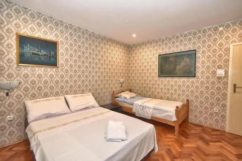 Ένα ή περισσότερα κρεβάτια σε δωμάτιο στο Enjoy a cozy apartment in Slatine 65 m² with terrace