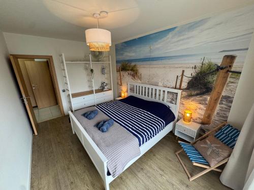 Ένα ή περισσότερα κρεβάτια σε δωμάτιο στο Appartement spacieux & familial à 400m de la plage d'Ostende 2 chambres avec patio by La Conciergerie