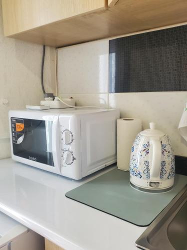 Kuchyň nebo kuchyňský kout v ubytování room