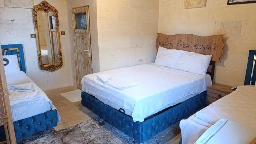 Ένα ή περισσότερα κρεβάτια σε δωμάτιο στο Butik otel ve sıra geceleri