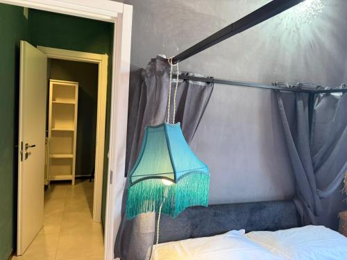 Ένα ή περισσότερα κρεβάτια σε δωμάτιο στο Minisuite Escape