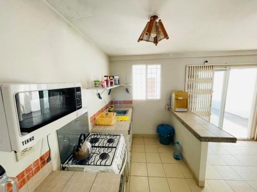 O bucătărie sau chicinetă la Villa Serena para familias y amigos - vista al mar