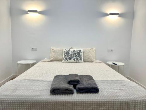 Ένα ή περισσότερα κρεβάτια σε δωμάτιο στο Apartamento Savaya Suite