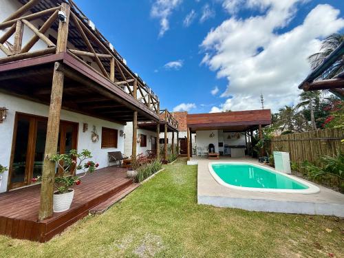 Πισίνα στο ή κοντά στο casa perfeita a 150m da praia com 6 suítes
