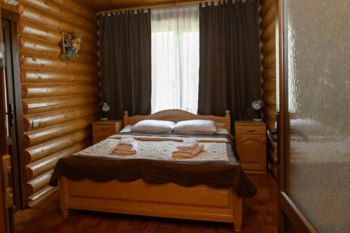 Postel nebo postele na pokoji v ubytování Guest House Sofia