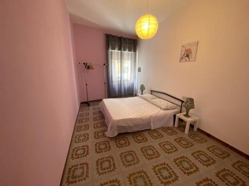 Postel nebo postele na pokoji v ubytování Apartment Sud Sardinia