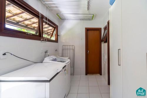 Ένα μπάνιο στο Reserva Imbassaí - Casa C03 Orquídeas