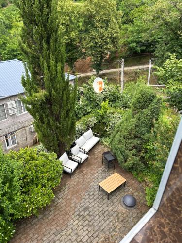 an overhead view of a patio with couches and a table at Green Villa Sea View in Gonio