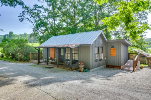 a small shed with a staircase in a driveway at 6 Mi to Helen Mtn-View Retreat with Hot Tub! in Clarkesville