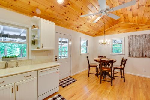a kitchen and dining room with a wooden ceiling at 6 Miles to Helen Cabin with Hot Tub and Views! in Clarkesville