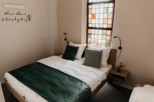 Postel nebo postele na pokoji v ubytování B&B Hemels Overnachten
