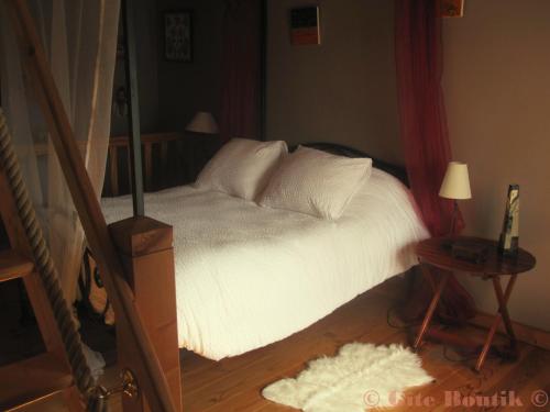Gîte Boutikにあるベッド