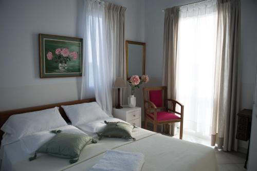 Tempat tidur dalam kamar di Villa Feia