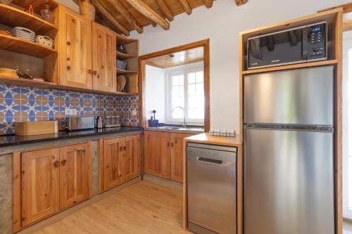 Kuchyň nebo kuchyňský kout v ubytování Casa da Mãe - Entre o Pico e a Maré