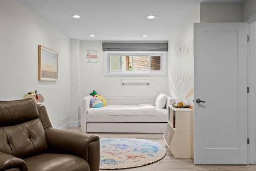 a living room with a couch and a bed at 1010 Rosehill Dr in Boulder