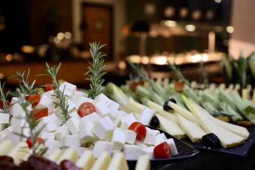 a bunch of food on plates on a table at Hotel Puerto Palace in Puerto de la Cruz