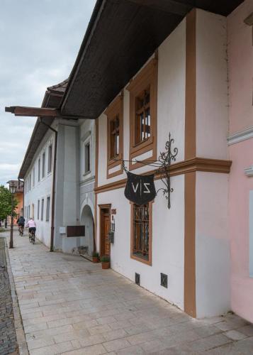 a sign on the side of a building at Vila Zipser in Poprad
