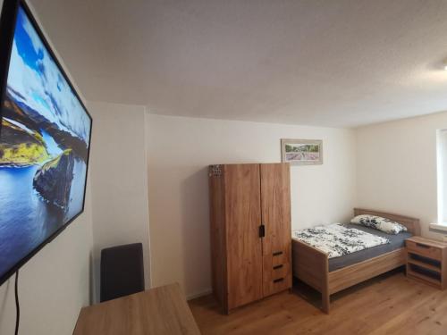 Ένα ή περισσότερα κρεβάτια σε δωμάτιο στο Schönes Apartment für Reisende und Berufstätige