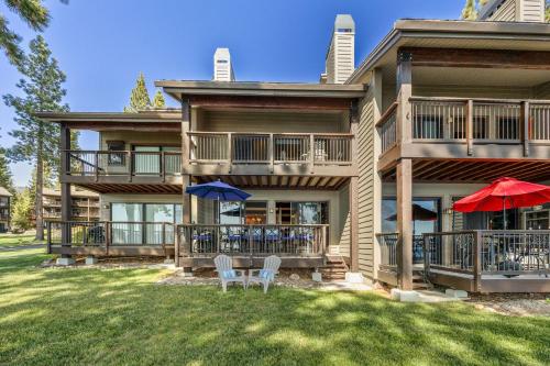 a house with two chairs and two umbrellas at Remodeled 4BR Lakefront with Exceptional Amenities in Kings Beach