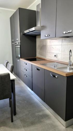 Kuchyň nebo kuchyňský kout v ubytování Residence Parco Castello 3