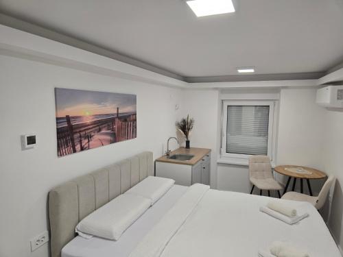 Ένα ή περισσότερα κρεβάτια σε δωμάτιο στο Edy