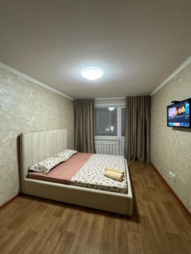 Ένα ή περισσότερα κρεβάτια σε δωμάτιο στο N40 Apartment