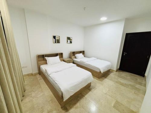 Cama o camas de una habitación en City Gem Wave