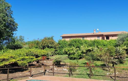 a garden in front of a building at Beautiful Home In Acquasparta -Tr- in Configni
