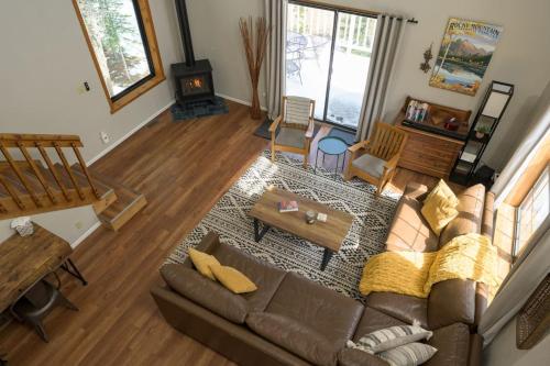 an overhead view of a living room with a couch at St Marys Glacier Retreat A Cozy Lakeside Escape in Idaho Springs