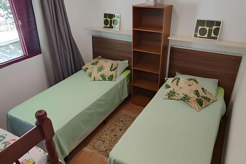 Giường trong phòng chung tại Casa Ecológica com PiSCiNAS super PrivAtiva