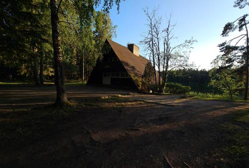 a barn sitting on the side of a road at Viitna Puhkekeskus in Viitna