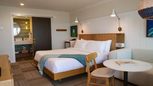 Ένα ή περισσότερα κρεβάτια σε δωμάτιο στο Oceaneer Hotel