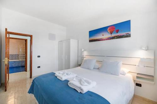 Ένα ή περισσότερα κρεβάτια σε δωμάτιο στο Casa Aurora