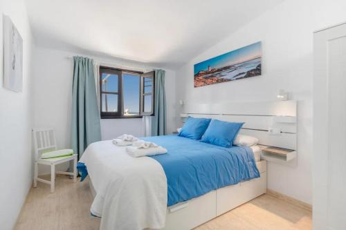 Ένα ή περισσότερα κρεβάτια σε δωμάτιο στο Casa Aurora