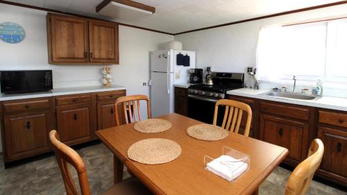 Kuchyň nebo kuchyňský kout v ubytování Coles Cove - Pet Friendly!