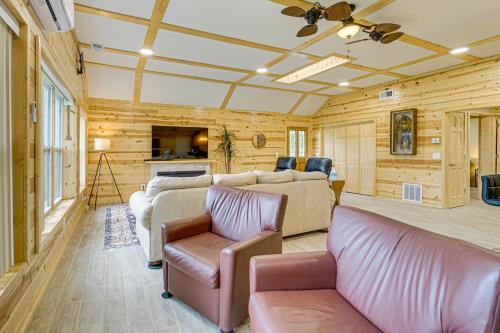 a living room with a couch and a chair at Walk to Shay Lake Updated Home with Water View! in Silverwood