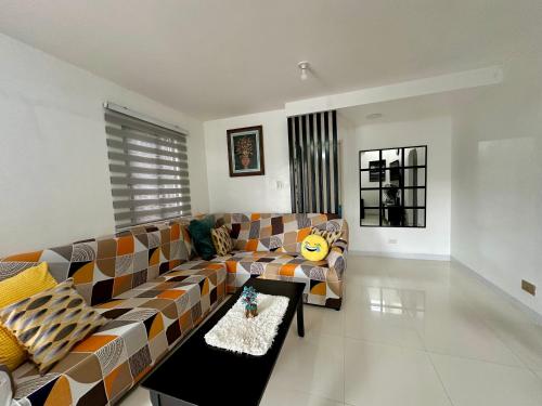 Posezení v ubytování JJs Transient Home Lipa