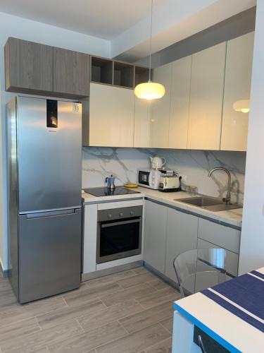 Dapur atau dapur kecil di Vala Mar Residence, Apartment in Hamallaj