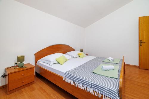 Katil atau katil-katil dalam bilik di Apartments Krunoslav