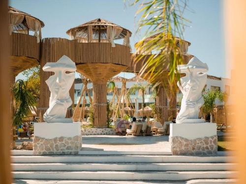Zahrada ubytování Alia Beachfront Suites and Spa